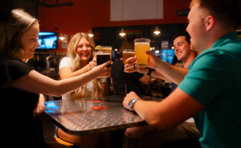 Friends do a toast at Parkersburg Brewing Company