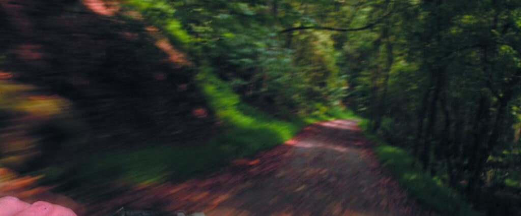 riding a bike down a trail