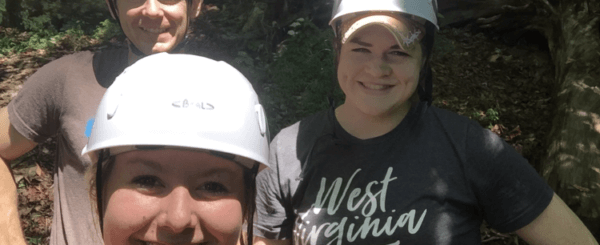 a group of climbers wearing helmets