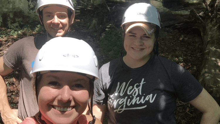 a group of climbers wearing helmets