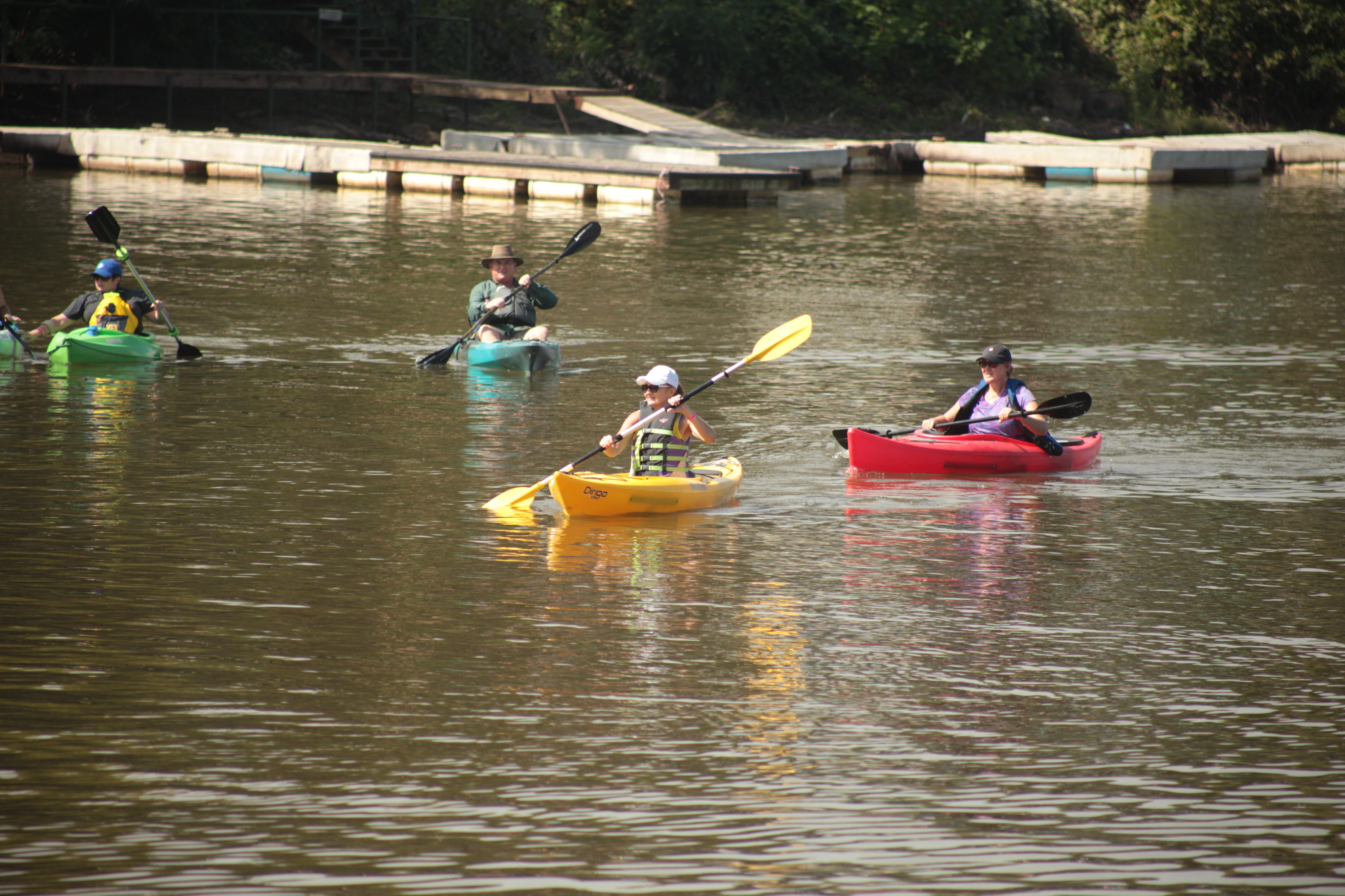 people kayaking on the river