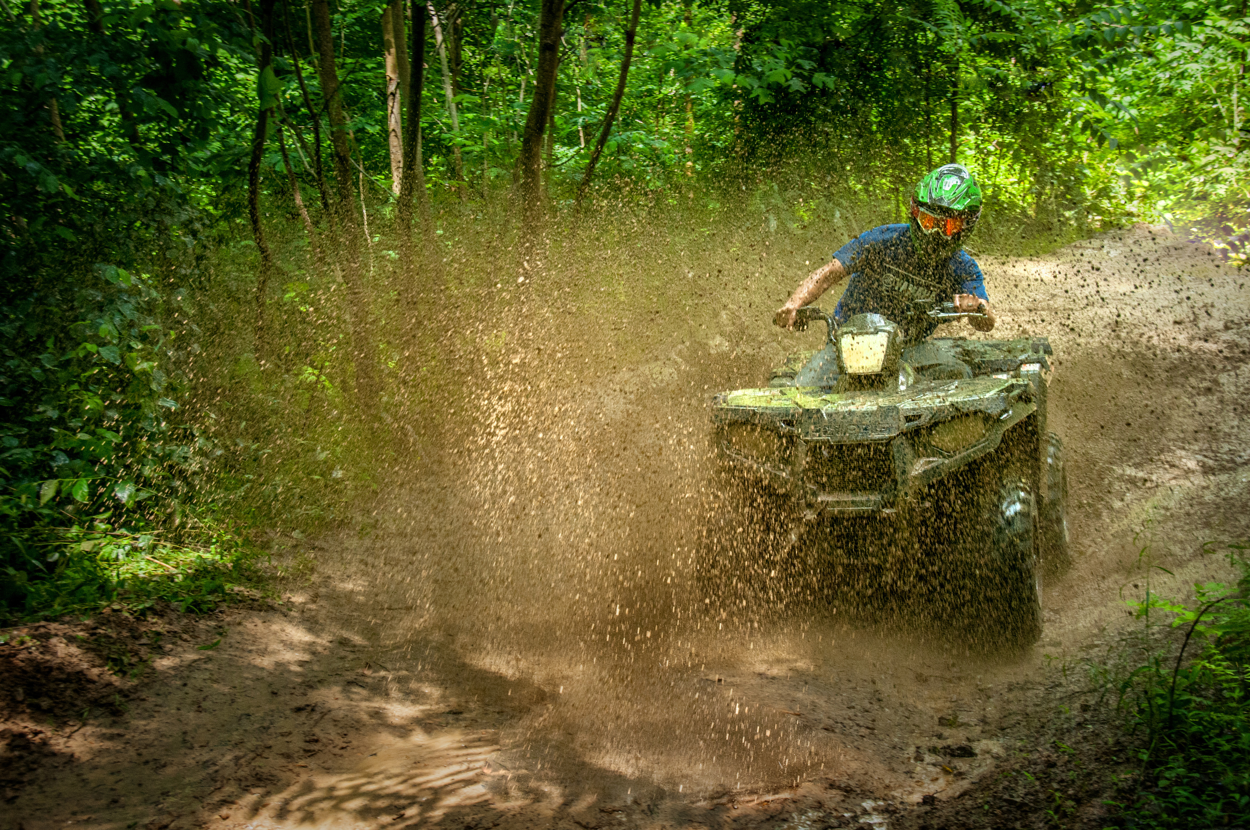 ATV riding in the mud