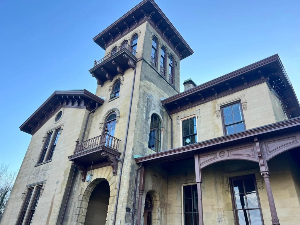 A photo from the ground looking up at the The Anchorage Mansion in Marietta, OH