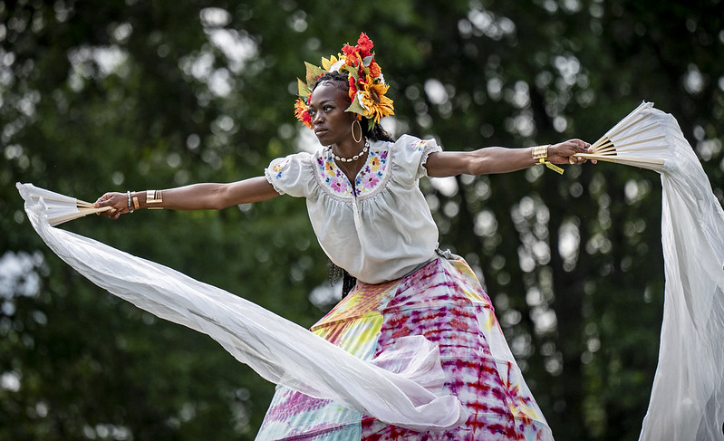 A woman doing an African Cirque performance.